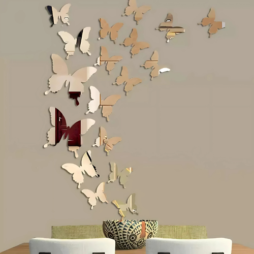 Butterfly wall decals on a beige wall with a table and chairs in the foreground.