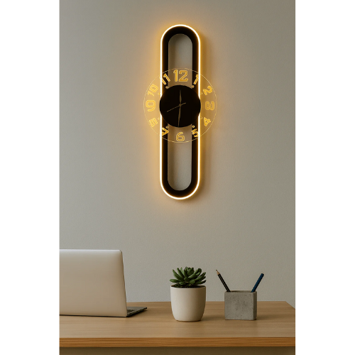 Modern wall clock with glowing edge on a neutral wall above a desk.
