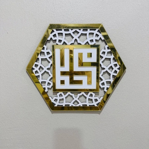Decorative wall art with geometric design and central emblem on a plain background