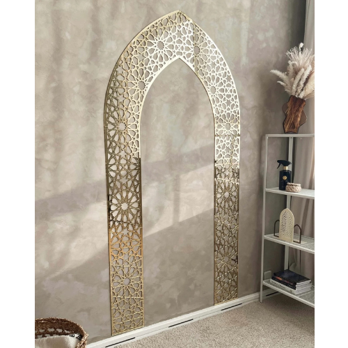 Decorative arch with intricate patterns in a room setting