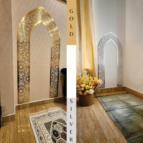 Decorative arches in gold and silver with a rug and flowers on a neutral background