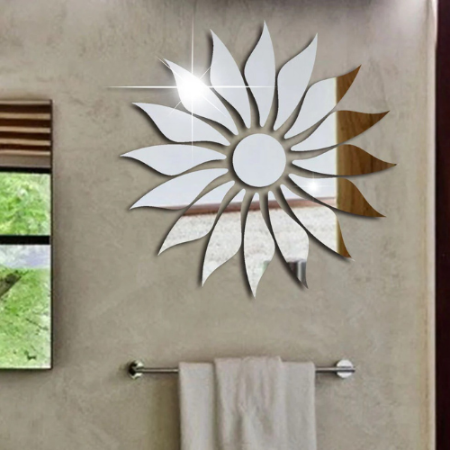 Decorative wall mirror with sunflower design on a beige wall.