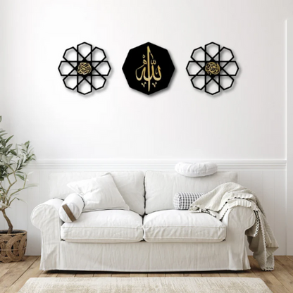 Decorative wall art pieces on a white wall above a white sofa.