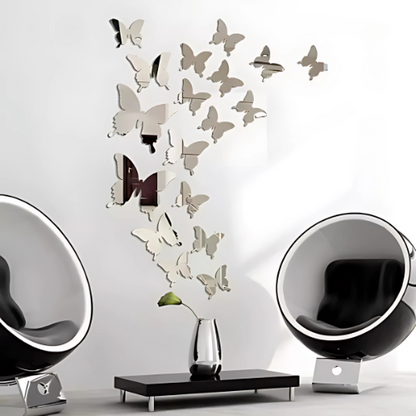 Butterfly mirror wall decals on a white wall with modern black and white furniture.