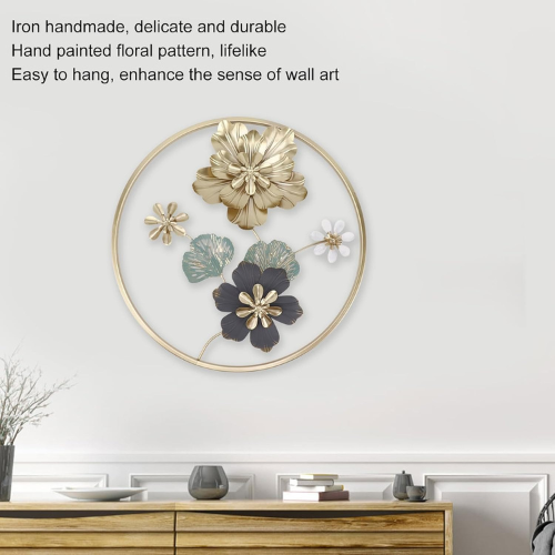 Decorative wall art with floral design on a white wall above a wooden cabinet.