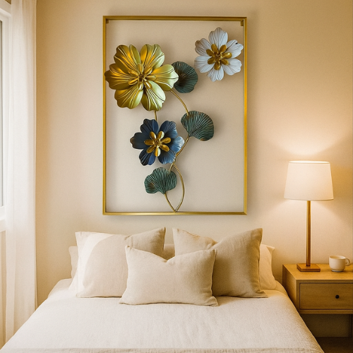 Decorative floral wall art above a bed with pillows and a lamp.